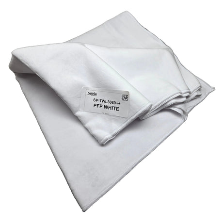A folded white microfiber cloth with a white paper label that reads 'Spilda SP-TWL3060++ PFP WHITE', displayed on a neutral gray surface.