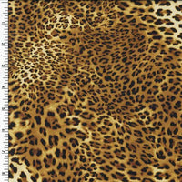 Poly-Spandex tricot fabric with an animal print pattern and measurement ruler on the side